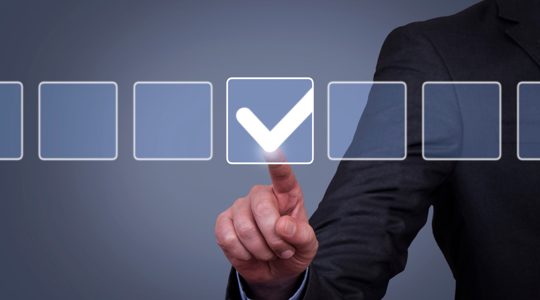 A man checking of a digital box